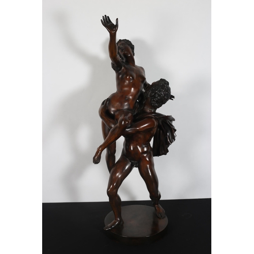 211 - after GIAMBOLOGNA 
A fine bronze figure modelled as a Roman male holding a naked maiden aloft shown ... 