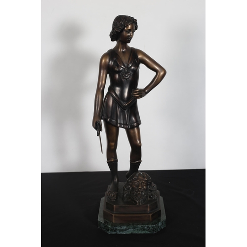 216 - after ANDREA DEL VERROCCHAO
A bronze figure modelled as David shown standing on a platform on a gree... 