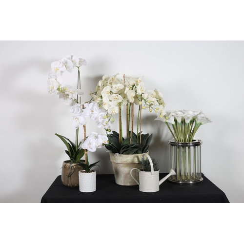 219 - A COLLECTION OF ARTIFICIAL FLOWERS with planters