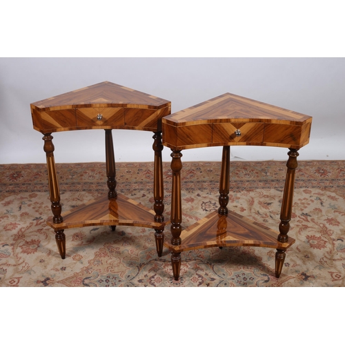 225 - A PAIR OF ART DECO STYLE KINGWOOD AND WALNUT OCCASIONAL TABLES each of triangular form the shaped to... 