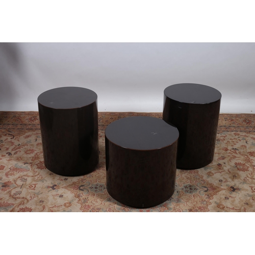 259 - THREE SIMULATED ROSEWOOD PEDESTALS each of cylindrical outline to include a pair 
54cm (h) x 40cm (d... 