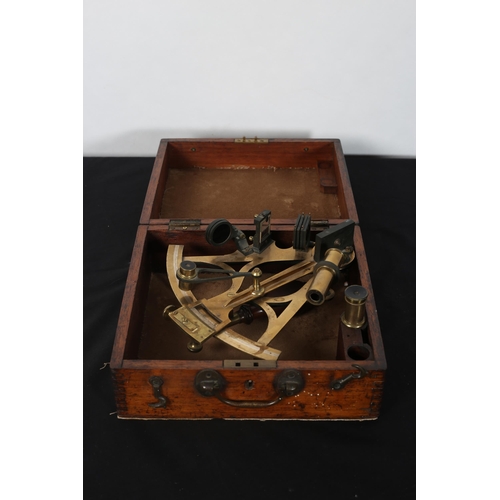 267 - E.F. LUNDY
A 19th century brass sextant in mahogany case with brass carrying handle
12cm (h) x 27cm ... 