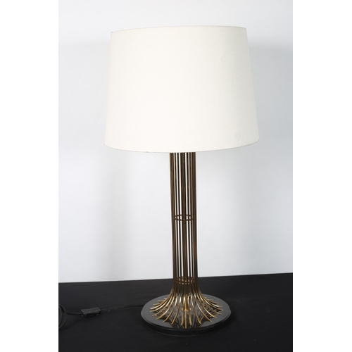 275 - A CONTINENTAL BRASS WIRE WORK TABLE LAMP the pierced cylindrical spreading column on a black marble ... 