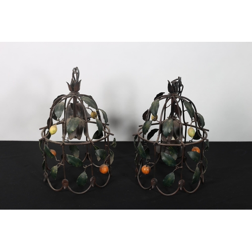 278 - A PAIR OF CONTINENTAL COPPER WIRE WORK AND POLYCHROME CENTRE LIGHTS each of domed form with foliate ... 