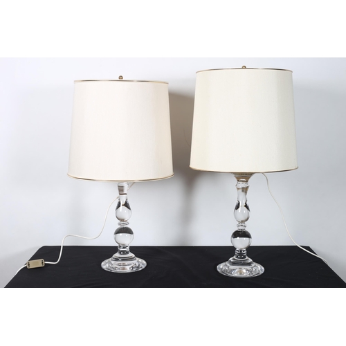 280 - A PAIR OF GLAZED TABLE LAMPS each with a baluster column raised on a circular spreading foot with sh... 