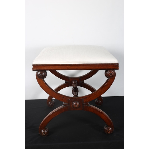 282 - A 19TH CENTURY MAHOGANY AND UPHOLSTERED STOOL the square upholstered seat on X-shaped supports with ... 