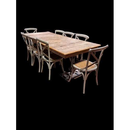 319 - A NINE PIECE DINING ROOM SUITE comprising eight bentwood chairs each with a curved top rail and X-sh... 