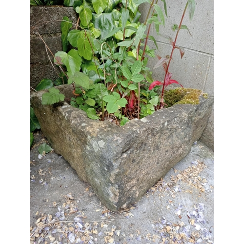 337 - A SANDSTONE TROUGH of rectangular outline 
24cm (h) x 45cm (w) x 49cm (d)