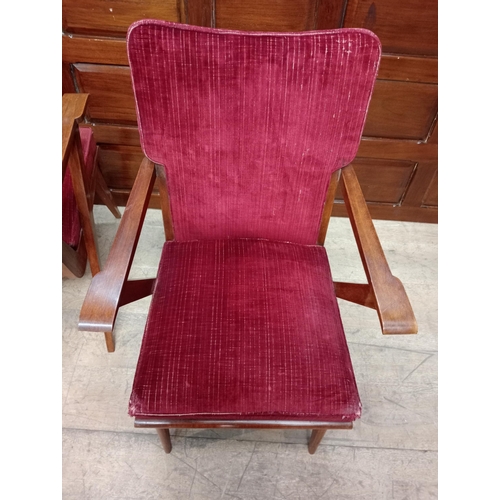 340 - A PAIR OF VINTAGE TEAK AND UPHOLSTERED ELBOW CHAIRS each with a shaped upholstered back and seat wit... 