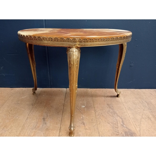 342 - AN ONYX AND GILT BRASS COFFEE TABLE of kidney shaped outline the shaped top on cabriole legs with sc... 