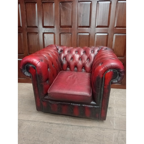 354 - A VICTORIAN STYLE HIDE UPHOLSTERED LIBRARY CHAIR the scroll over buttoned upholstered back and seat ... 