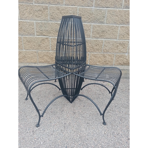 370 - A WROUGHT IRON CONVERSATION SEAT with cylindrical uprights and slatted shaped seats on tubular legs ... 