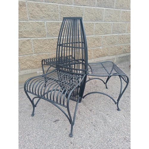 370 - A WROUGHT IRON CONVERSATION SEAT with cylindrical uprights and slatted shaped seats on tubular legs ... 