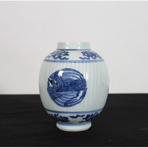 429 - A CHINESE BLUE AND WHITE VASE of ovoid tapering form the white ground decorated with stylised birds ... 