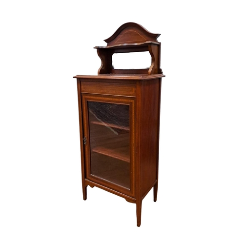 76 - AN EDWARDIAN MAHOGANY AND SATINWOOD INLAID DISPLAY CABINET the superstructure with bevelled glass mi... 