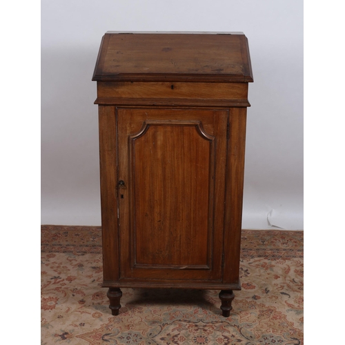 82 - A 19TH CENTURY MAHOGANY CLERK'S DESK of rectangular outline the hinged writing slope above a cupboar... 