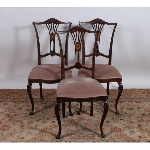 220 - A SET OF THREE EDWARDIAN MAHOGANY AND SATINWOOD INLAID SIDE CHAIRS each with a shaped top rail and p... 