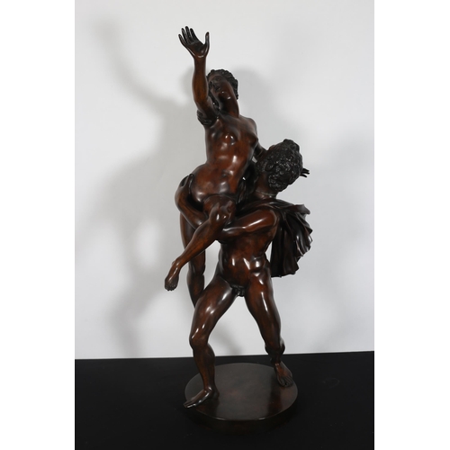 304 - after GIAMBOLOGNA A fine bronze figure modelled as a Roman male holding a naked maiden aloft shown s... 