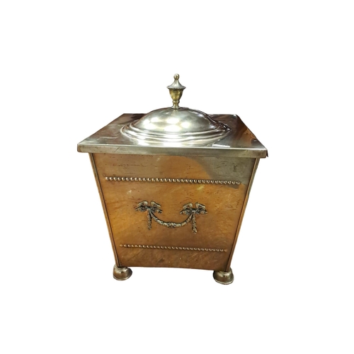 466 - A VINTAGE BRASS LIDDED FUEL BIN of rectangular tapering form with brass ring handles on bun feet 38c... 