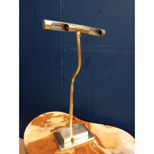 496 - A BRASS TABLE LAMP with adjustable arm raised on a rectangular stepped base 50cm (h) x 22cm (w) x 12... 