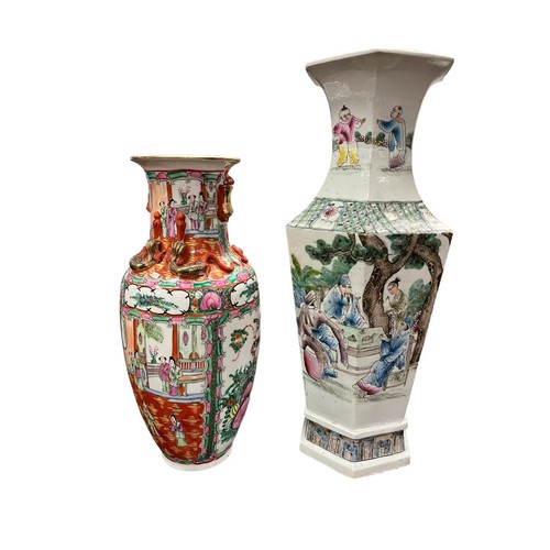 453 - A PORCELAIN FAMILLE ROSE VASES the white and turquoise ground decorated with figures in a landscape ... 