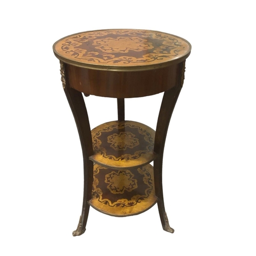 10 - A CONTINENTAL KINGWOOD MARQUETRY AND GILT BRASS MOUNTED TABLE of circular outline the shaped top wit... 