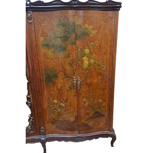 101 - A CONTINENTAL STAINED WOOD AND POLYCHROME FIVE DOOR WARDROBE the carved cornice above a central mirr... 