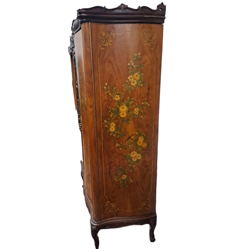 101 - A CONTINENTAL STAINED WOOD AND POLYCHROME FIVE DOOR WARDROBE the carved cornice above a central mirr... 