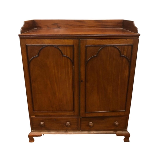 19 - A GEORGIAN MAHOGANY CUPBOARD of rectangular outline the shaped top with moulded three quarter galler... 