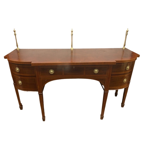 2 - A GEORGIAN MAHOGANY AND SATINWOOD INLAID SIDEBOARD of rectangular bowed breakfront outline with bras... 