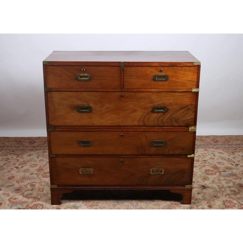 223 - A GEORGIAN MAHOGANY AND BRASS BOUND MILITARY CHEST ON CHEST of rectangular outline the shaped top ab... 