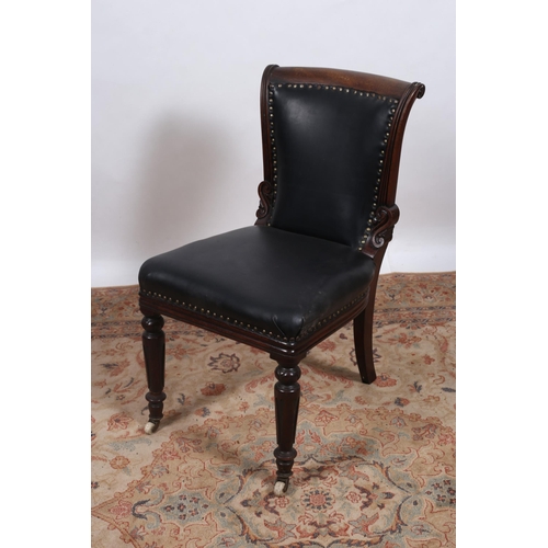 242 - A WILLIAM IV CARVED MAHOGANY SIDE CHAIR the curved top rail with an upholstered back and seat with b... 