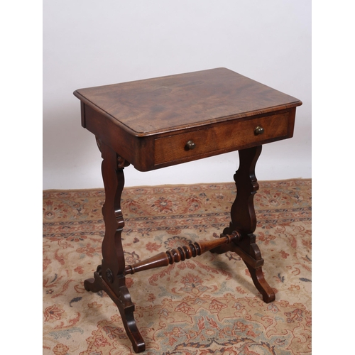 243 - A 19TH CENTURY MAHOGANY OCCASIONAL TABLE of rectangular outline the shaped top with frieze drawer on... 