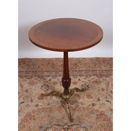 247 - A MAHOGANY CROSSBANDED SNAP TOP OCCASIONAL TABLE the circular moulded top above a baluster column on... 