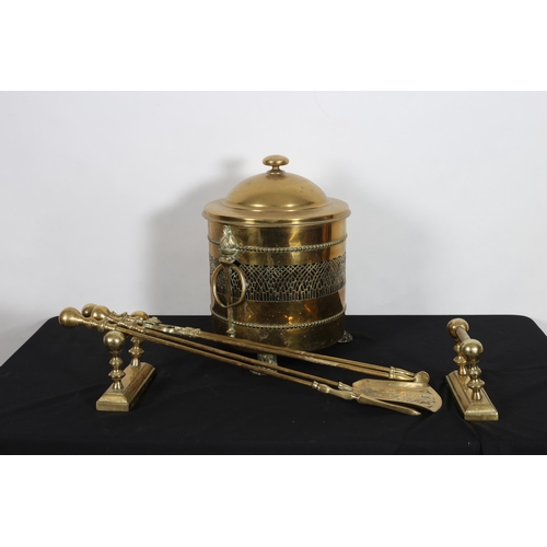 269 - A BRASS LIDDED FUEL BIN of cylindrical form with liner on claw feet, A SET OF THREE BRASS FIRE IRONS... 