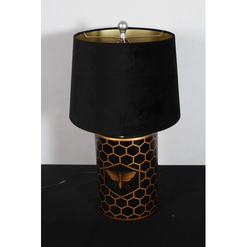 280 - A FERN COTTAGE INTERIORS GLAZED CHINA TABLE LAMP of cylindrical form the black ground decorated the ... 