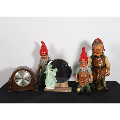 281 - THREE COMPOSITION AND POLYCHROME FIGURES each modelled as gnome shown standing, A VINTAGE STAINED WO... 