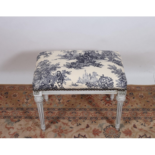 300 - A CONTINENTAL WHITE PAINTED AND UPHOLSTERED STOOL of rectangular form the upholstered seat with bras... 