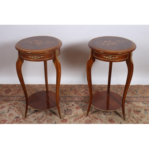 302 - A PAIR OF CONTINENTAL KINGWOOD MARQUETRY AND GILT BRASS MOUNTED TABLES each of circular outline the ... 