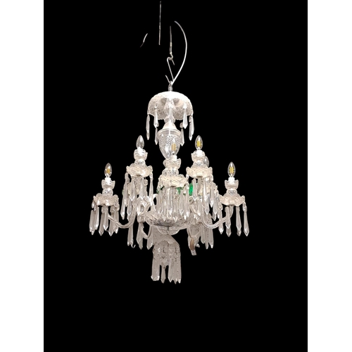 348 - A FINE WATERFORD CUT GLASS TEN BRANCH CHANDELIER in two registers hung with faceted pendants 100cm d... 