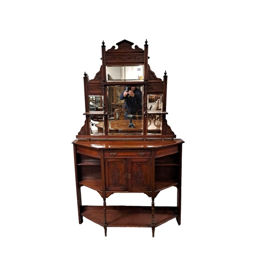 356 - AN EDWARDIAN MAHOGANY SIDE CABINET of rectangular outline with canted angles above a frieze drawer a... 