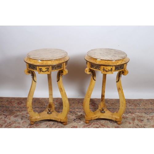 363 - A PAIR OF CONTINENTAL WALNUT GILT BRASS MOUNTED MARBLE JARDINIERE TABLES each of circular outline su... 