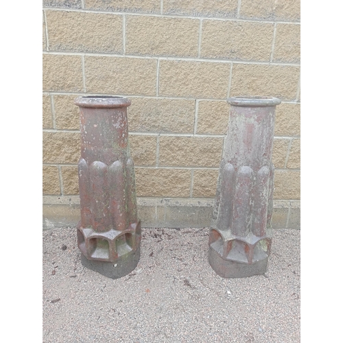 380 - A PAIR OF GLAZED TERRACOTTA CHIMNEY STACKS each of cylindrical lobed form 100cm (h) x 40cm (d)