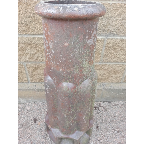 380 - A PAIR OF GLAZED TERRACOTTA CHIMNEY STACKS each of cylindrical lobed form 100cm (h) x 40cm (d)