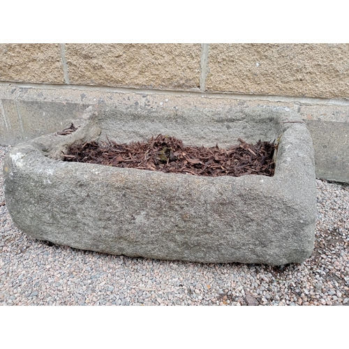 395 - A 19TH CENTURY STONE TROUGH of rectangular form 30cm (h) x 65cm (w) x 46cm (d)