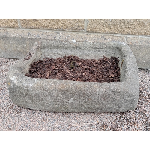 395 - A 19TH CENTURY STONE TROUGH of rectangular form 30cm (h) x 65cm (w) x 46cm (d)