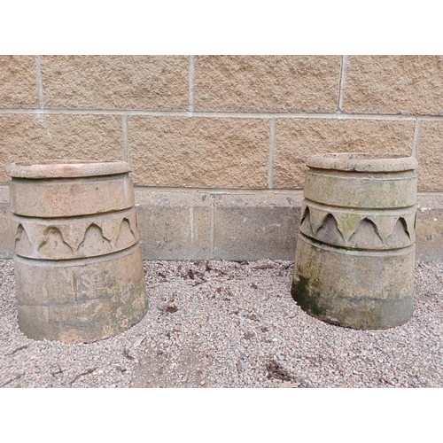 405 - A PAIR OF TERRACOTTA GLAZED CHIMNEY POTS each of cylindrical spreading form 36cm (h) x 29cm (d)