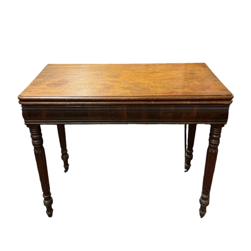 409 - A REGENCY MAHOGANY FOLDOVER SUPPER TABLE of rectangular outline the hinged lid above a moulded apron... 