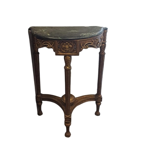 416 - A CONTINENTAL GILTWOOD AND MARBLE CONSOLE TABLE of demi lune outline the shaped top with eared corne... 