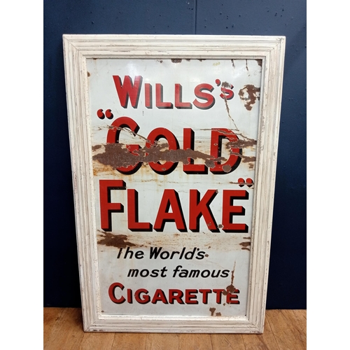 421 - A VINTAGE ENAMEL SIGN inscribed 'Wills Gold Flake The World's Most Famous Cigarette' in painted fram... 